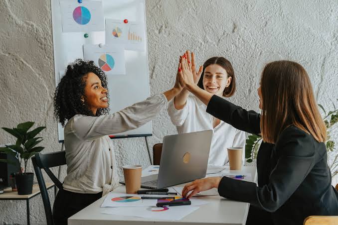 Diverse Synexiin consulting team collaborating